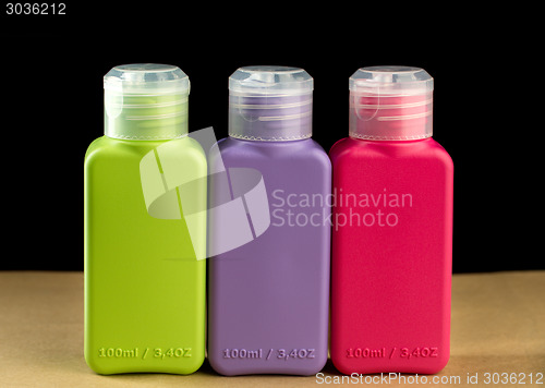 Image of colored plastic bottles