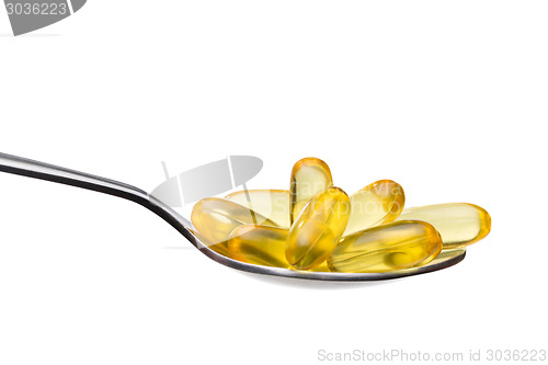 Image of Omega-3 pills on spoon