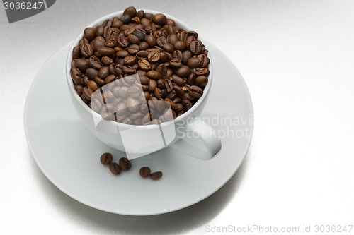 Image of Coffee beans with cup