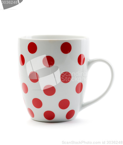 Image of Porcelain cup with red polka dots