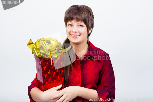 Image of Young girl with a gift box