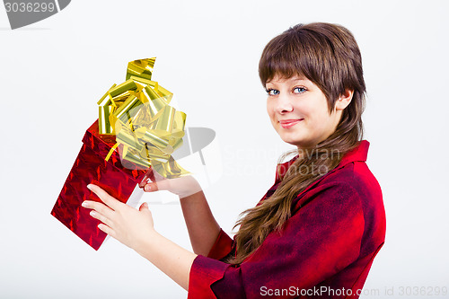 Image of Young girl with a gift box