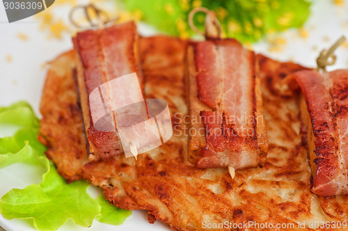 Image of veal meat with bacon