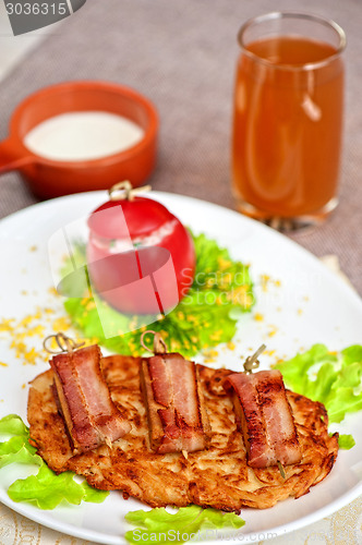 Image of veal meat with bacon