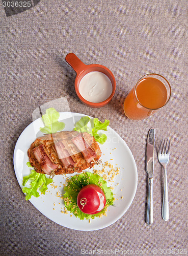 Image of veal meat with bacon