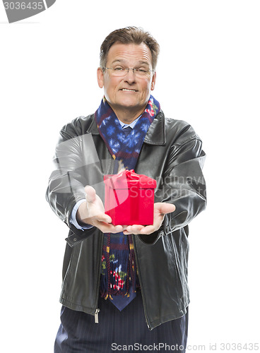 Image of Man Wearing Black Leather Jacket Holding Christmas Gift on White