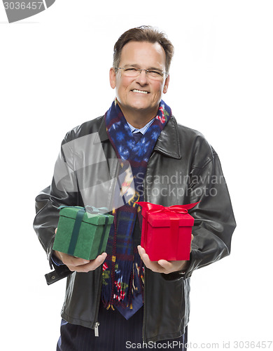 Image of Man Wearing Black Leather Jacket Holding Christmas Gifts on Whit