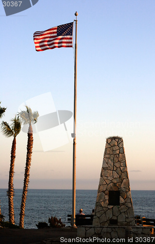 Image of US Flag by the ocean