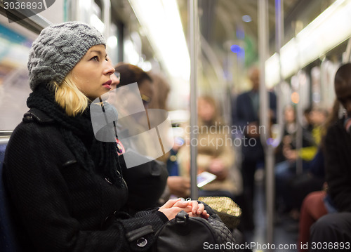Image of Woman on subway.