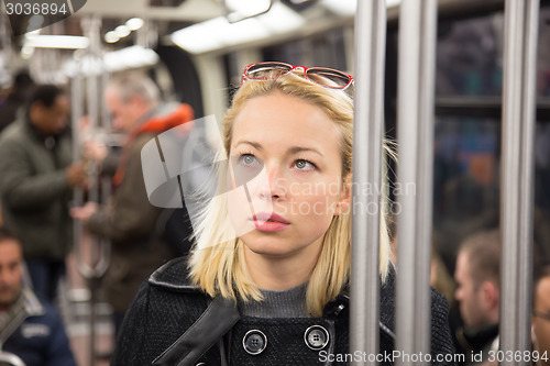 Image of Woman on subway.