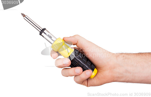 Image of Old used screwdriver with plastic grip