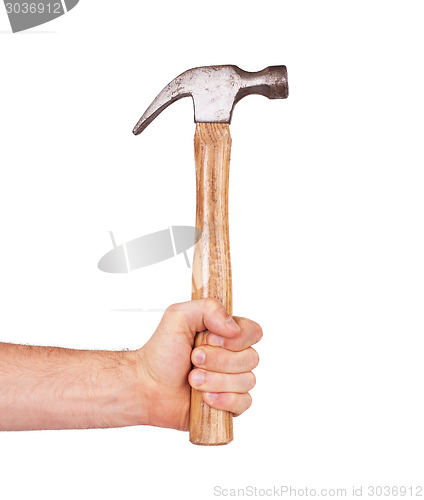 Image of Man's hand holding hammer