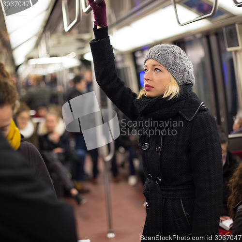 Image of Woman on subway.