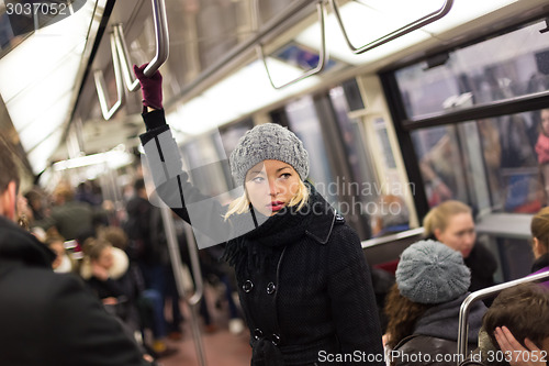 Image of Woman on subway.