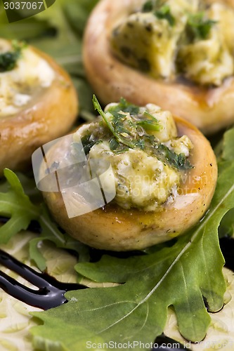 Image of Delicious stuffed mushrooms with cheese and pesto