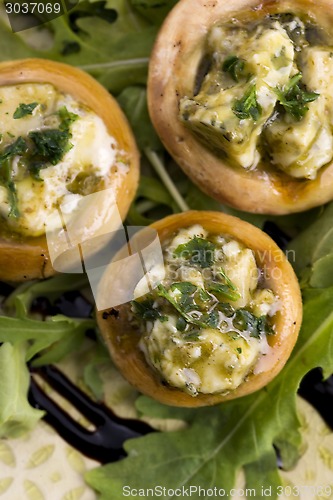 Image of Delicious stuffed mushrooms with cheese and pesto