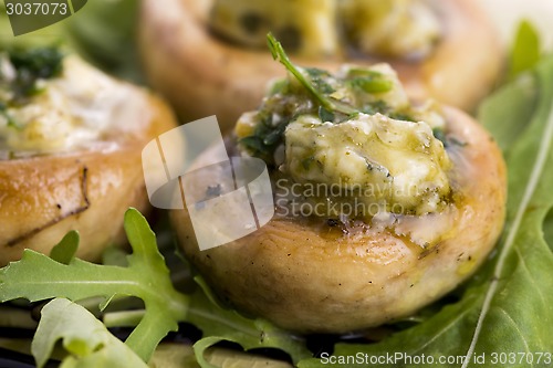 Image of Delicious stuffed mushrooms with cheese and pesto