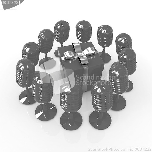 Image of microphones around gift box