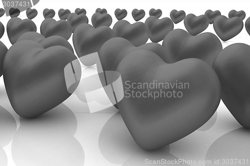 Image of One red heart standing out in crowd 