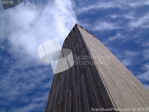 Image of Tower touching the clouds