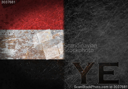 Image of Old rusty metal sign with a flag and country abbreviation
