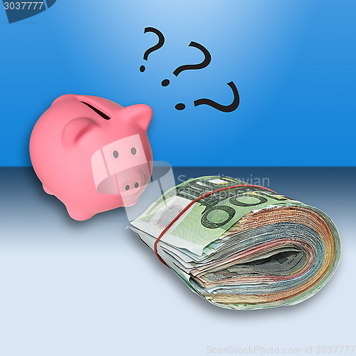 Image of Euro banknotes and money box