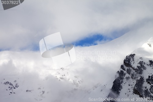 Image of View on off-piste slope in clouds