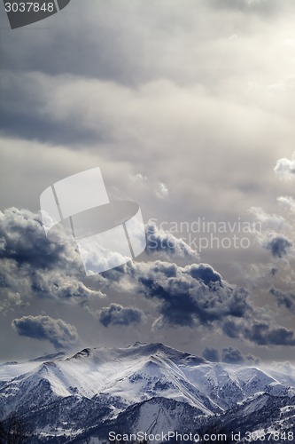 Image of Mountains in evening and cloudy sky
