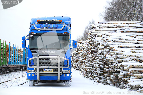 Image of Blue Scania R580 V8 Logging Truck at Railway Timber Yard