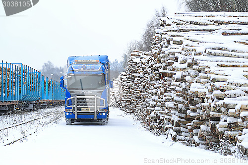 Image of Blue Scania R580 V8 Logging Truck at Railway Timber Yard