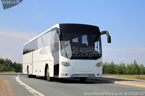 Image of White Bus on the Road