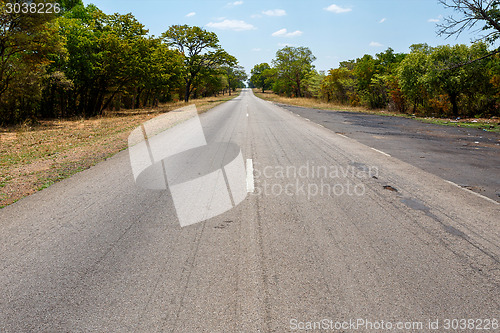 Image of Endless road with blue sky