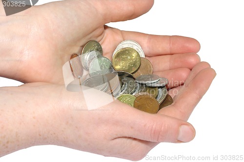 Image of Hand holding coins