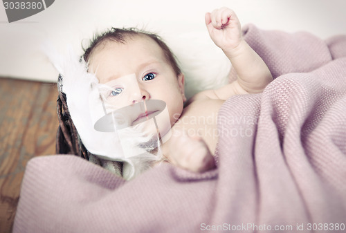 Image of little baby in basket