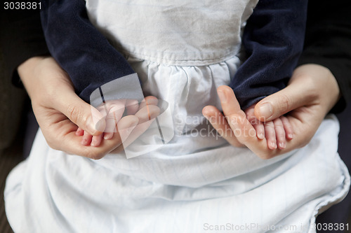 Image of infant mother hands