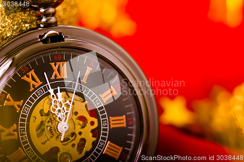 Image of Christmas card. background with a clock and decorations. macro