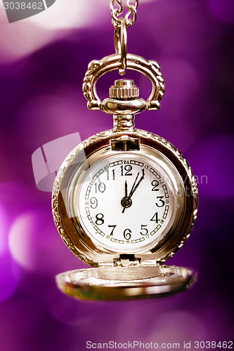 Image of Christmas card. background with a clock and decorations. macro