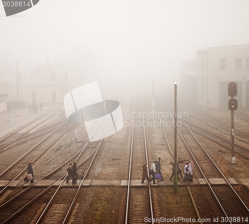 Image of train station with passenger