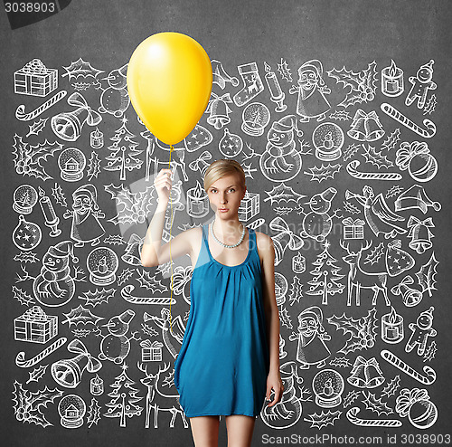 Image of Woman Looking For Christmas Gifts
