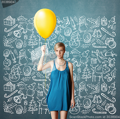 Image of Woman Looking For Christmas Gifts