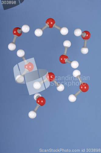 Image of H2O Water Molecules Falling