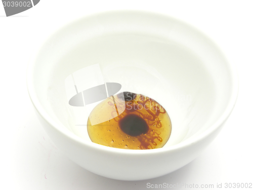 Image of Chinaware with honey and syrup