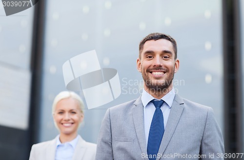 Image of close up of smiling businessmen