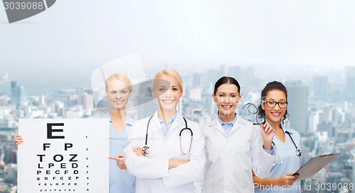 Image of smiling female eye doctors and nurses