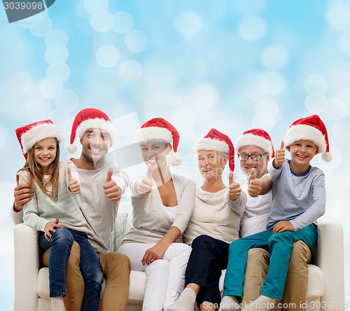 Image of happy family sitting on couch