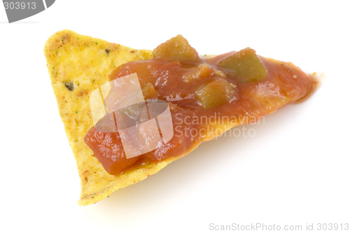 Image of Nacho chip dripped with salsa sauce

