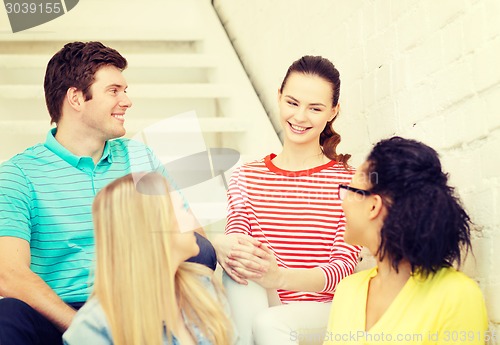 Image of smiling teenagers hanging out