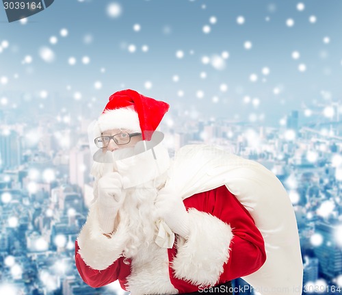 Image of man in costume of santa claus with bag