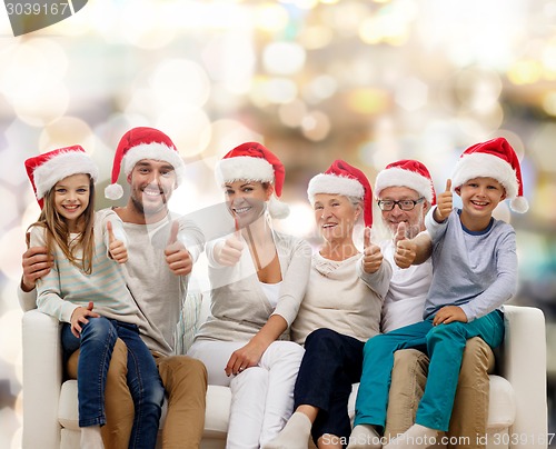 Image of happy family sitting on couch