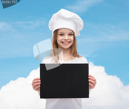 Image of little cook or baker with blank black paper